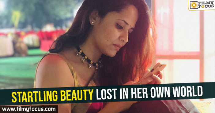 Pic Talk- Startling beauty lost in her own world