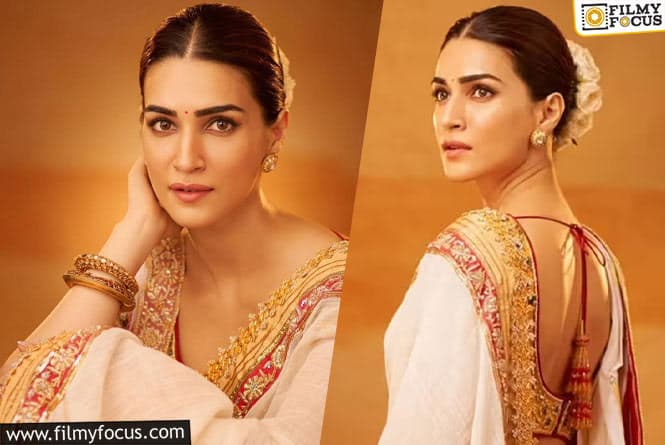 Pic talk: Kriti Sanon Attends the Adipurush Trailer Launch in a Captivating Gold Saree that is Beautifully Crafted by Abu Jani Sandeep Khosla